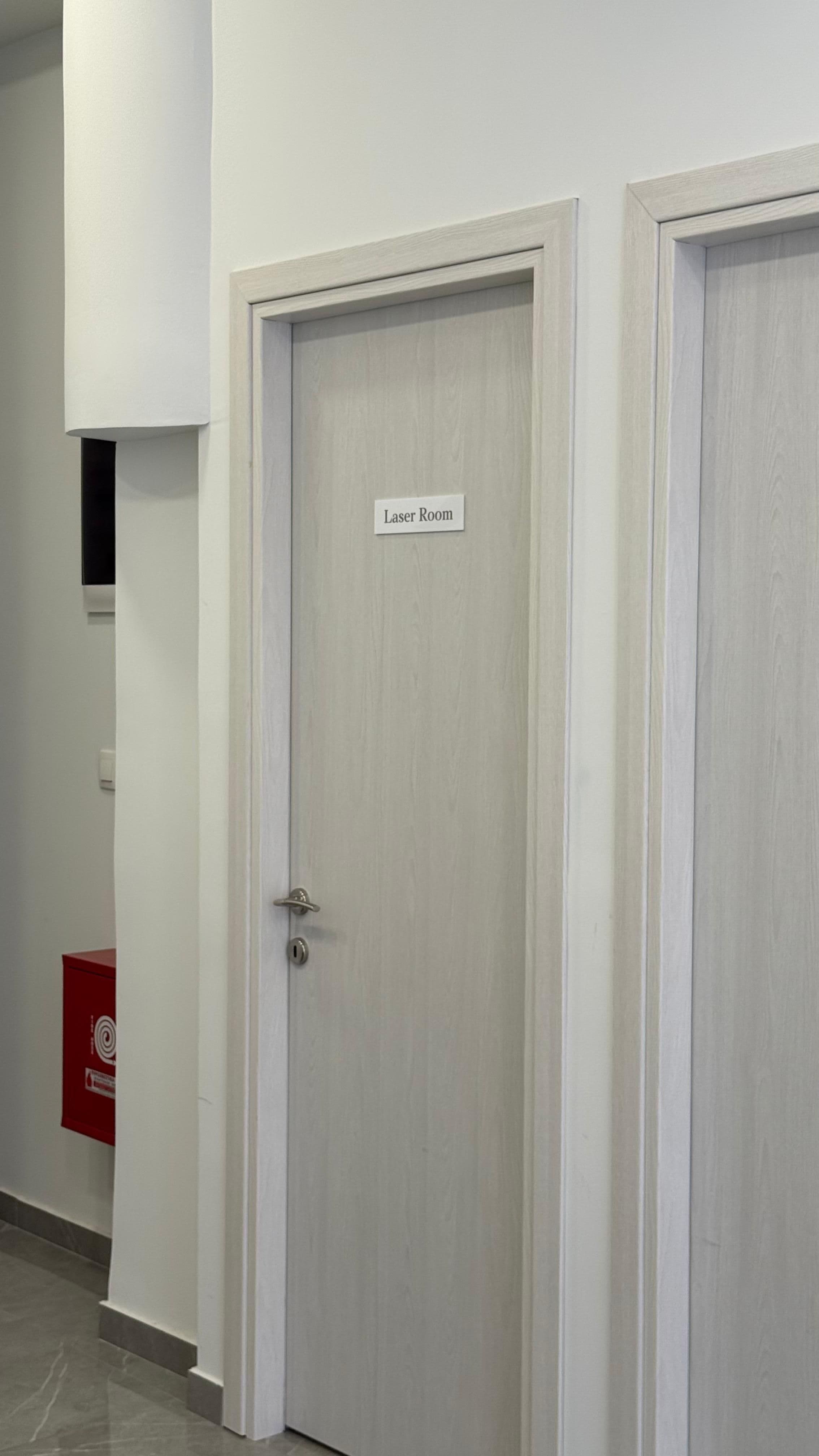 Kaiser Derma Clinic — treatment room corridor