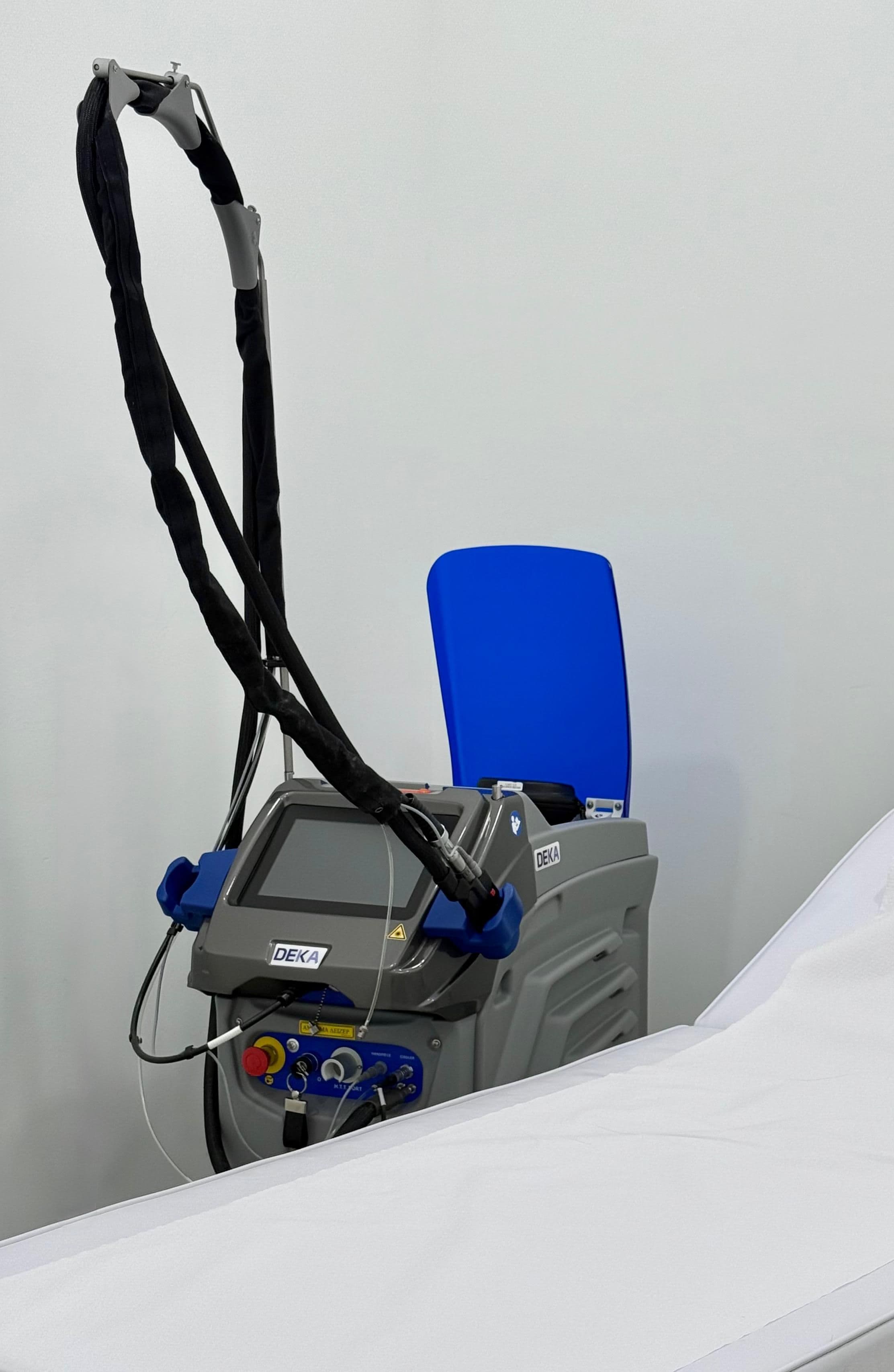 Kaiser Derma Clinic — laser hair removal device on treatment bed